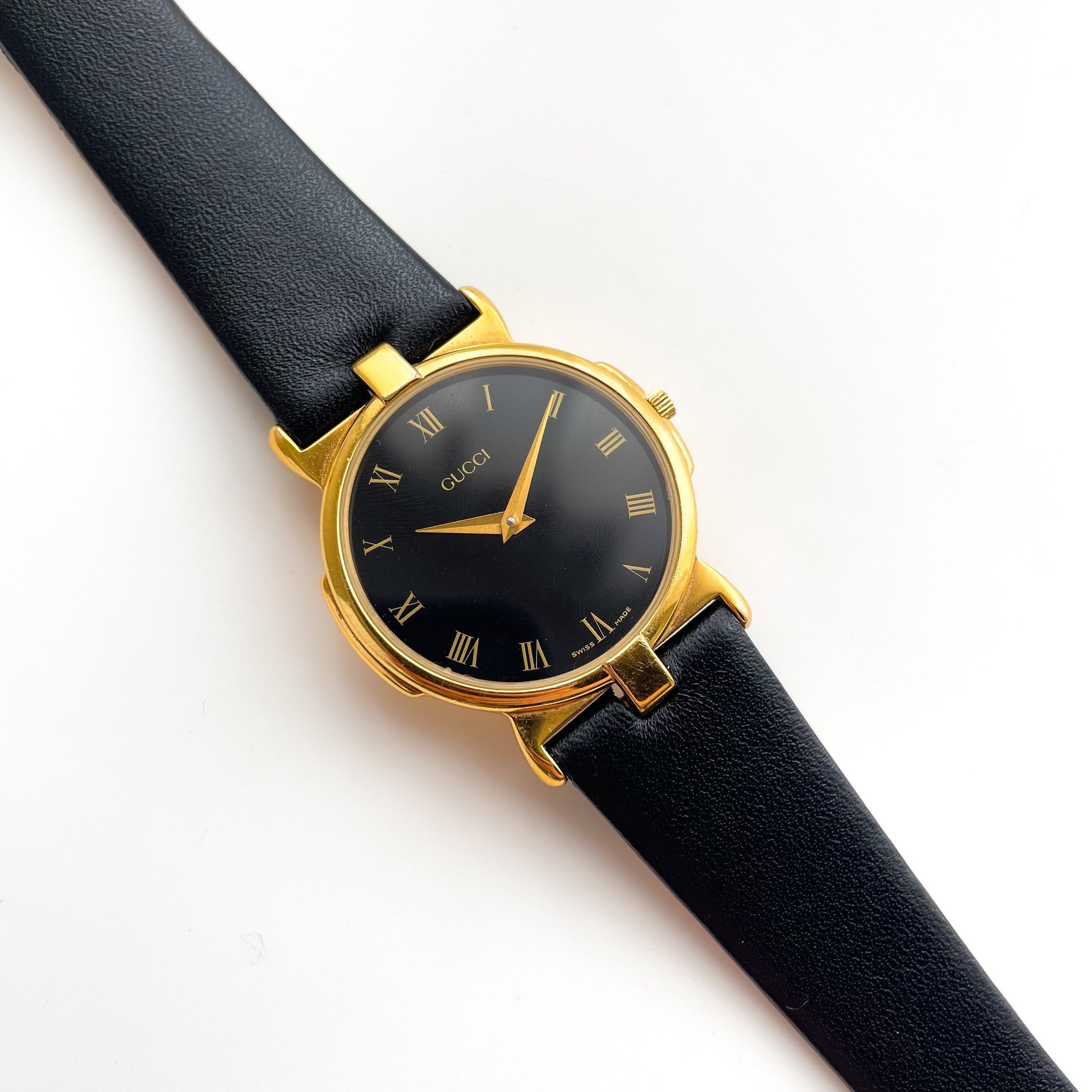 90s Gold Plated Gucci Unisex Watch with Black Leather Strap