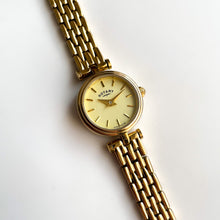 Load image into Gallery viewer, Petite Ladies&#39; Rotary Quartz Watch With Gold-Plated Bracelet and Round Dial
