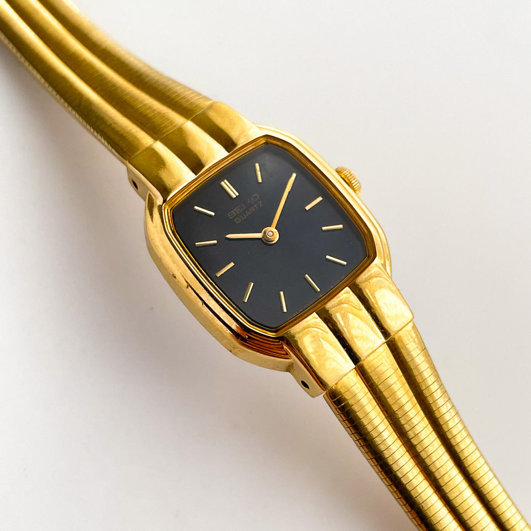 1990s Ladies' Gold-Plated Seiko Quartz Watch with Black Dial