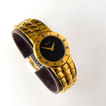 Load image into Gallery viewer, Vintage Gold-Plated Gucci Quartz Watch with Black Dial and Roman Numerals
