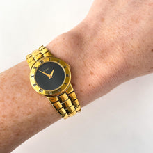 Load image into Gallery viewer, Vintage Gold-Plated Gucci Quartz Watch with Black Dial and Roman Numerals
