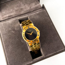 Load image into Gallery viewer, Vintage Gold-Plated Gucci Quartz Watch with Black Dial and Roman Numerals
