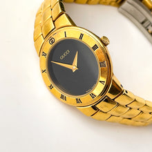 Load image into Gallery viewer, Vintage Gold-Plated Gucci Quartz Watch with Black Dial and Roman Numerals
