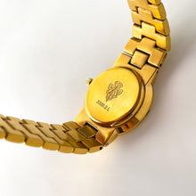 Load image into Gallery viewer, Vintage Gold-Plated Gucci Quartz Watch with Black Dial and Roman Numerals
