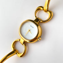 Load image into Gallery viewer, 1990s Gucci Quartz Watch with Mother of Pearl Dial and Semi Bangle Bracelet
