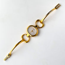 Load image into Gallery viewer, 1990s Gucci Quartz Watch with Mother of Pearl Dial and Semi Bangle Bracelet
