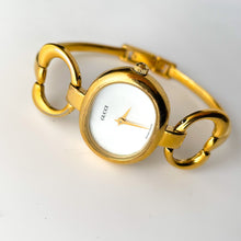 Load image into Gallery viewer, 1990s Gucci Quartz Watch with Mother of Pearl Dial and Semi Bangle Bracelet
