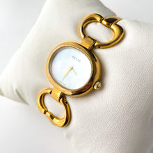 Load image into Gallery viewer, 1990s Gucci Quartz Watch with Mother of Pearl Dial and Semi Bangle Bracelet
