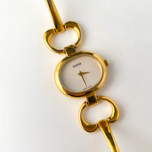 Load image into Gallery viewer, 1990s Gucci Quartz Watch with Mother of Pearl Dial and Semi Bangle Bracelet
