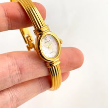 Load image into Gallery viewer, Very Rare 1995 Gold-Plated Lassale (Seiko) Articulated Bangle Quartz Watch with Mother of Pearl Dial
