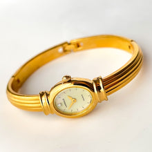 Load image into Gallery viewer, Very Rare 1995 Gold-Plated Lassale (Seiko) Articulated Bangle Quartz Watch with Mother of Pearl Dial
