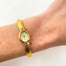 Load image into Gallery viewer, Very Rare 1995 Gold-Plated Lassale (Seiko) Articulated Bangle Quartz Watch with Mother of Pearl Dial
