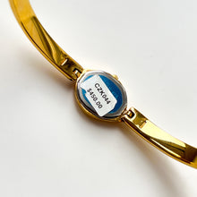 Load image into Gallery viewer, Very Rare 1990s Gold-Plated Lassale (Seiko) Articulated Bangle Quartz Watch with Mother of Pearl Dial and Diamond-Set Bezel
