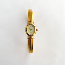 Load image into Gallery viewer, Very Rare 1995 Gold-Plated Lassale (Seiko) Articulated Bangle Quartz Watch with Mother of Pearl Dial
