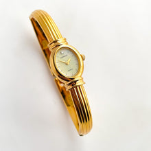 Load image into Gallery viewer, Very Rare 1995 Gold-Plated Lassale (Seiko) Articulated Bangle Quartz Watch with Mother of Pearl Dial
