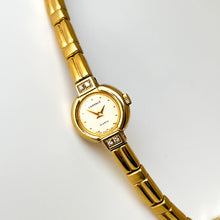 Load image into Gallery viewer, Rare Tiny 1990s Gold-Plated Lassale (Seiko) Quartz Watch with Round Dial and Genuine Diamonds
