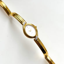 Load image into Gallery viewer, Very Rare 1990s Gold-Plated Lassale (Seiko) Articulated Bangle Quartz Watch with Mother of Pearl Dial and Diamond-Set Bezel
