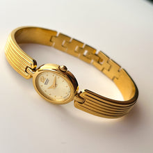 Load image into Gallery viewer, Vintage 1990s Gold-Plated Ladies&#39; Seiko Quartz Watch With Semi Bangle Bracelet
