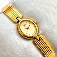 Load image into Gallery viewer, Vintage 1990s Gold-Plated Ladies&#39; Seiko Quartz Watch With Semi Bangle Bracelet
