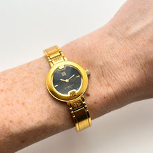 Load image into Gallery viewer, Vintage Gold-Plated Ladies&#39; Givenchy Bangle Watch with Black Dial and Quartz Movement
