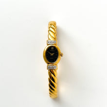 Load image into Gallery viewer, Rare 1990s Gold-Plated Lassale (Seiko) Articulated Bangle Quartz Watch with Black Dial and Diamond-Set Bezel
